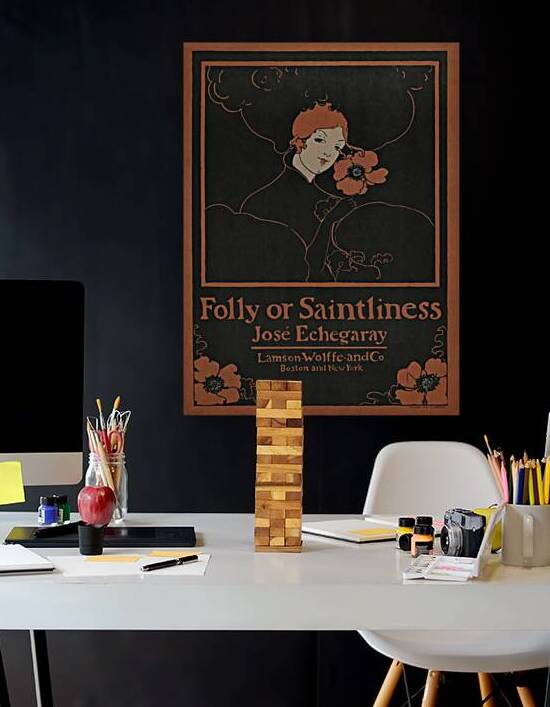 Folly or Saintliness 1895 vintage poster of a woman with flowers by Ethel Reed.  by IStockHistory com